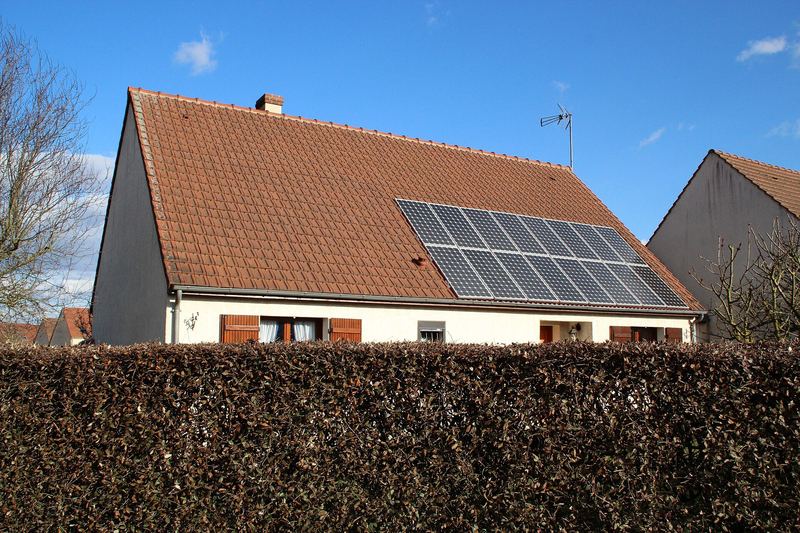 Home with rooftop solar panels